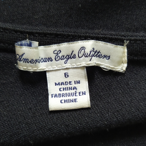 Black Sleeveless Peplum Dress - Picture 5 of 7